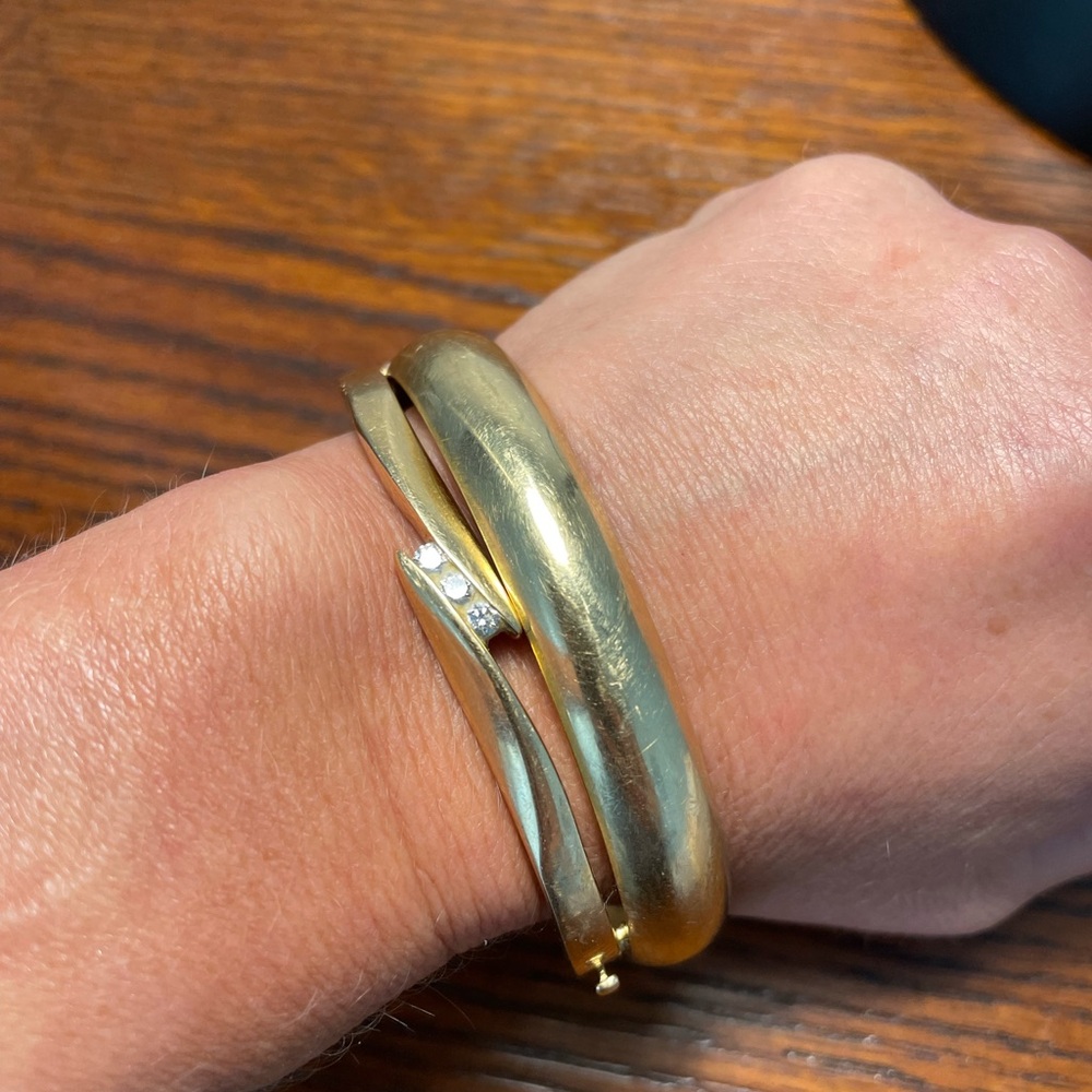 two 14k gold bangle bracelets